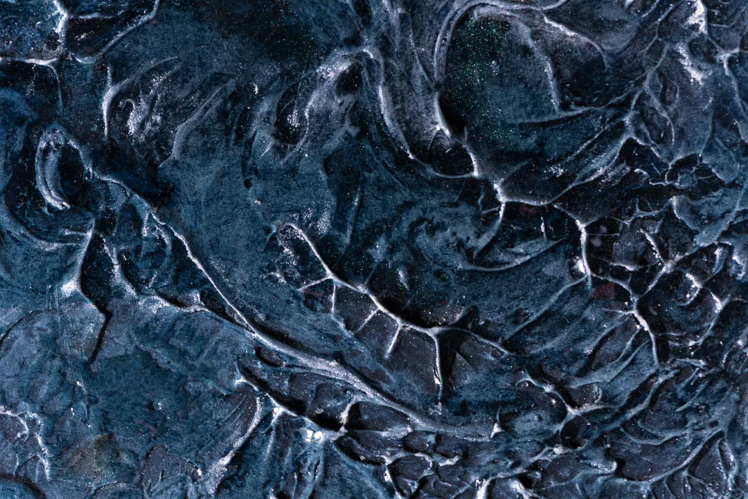 The illusionist_Sian Evans Inc_Snippet 5 Close-up dark textured surface with oil and structural medium